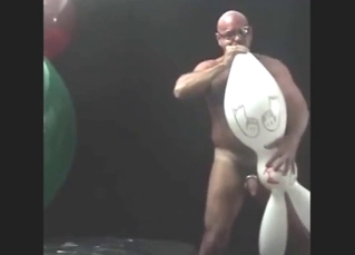 Old dude fucks a rabbit ballon or something